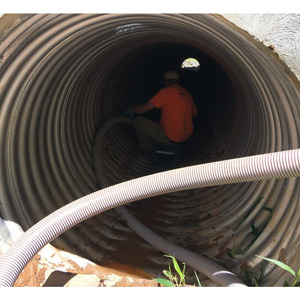Stream Vacuum crew remove sediment that deposited in large stormwater pipe of a development.